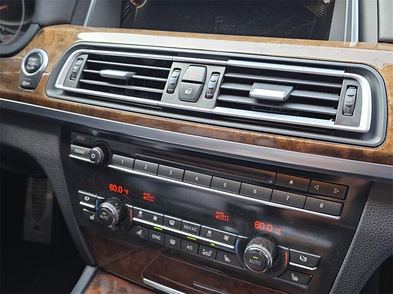 used 2015 BMW 750 car, priced at $18,691