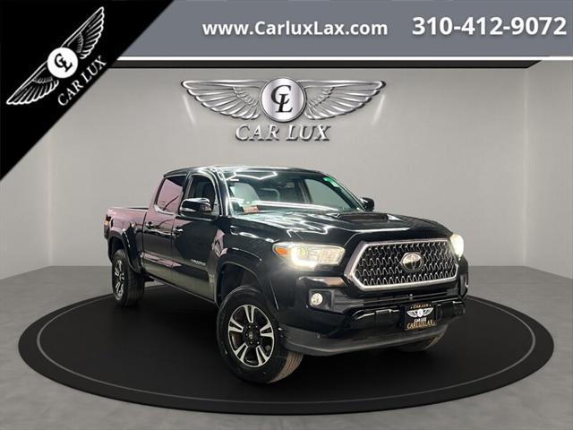 used 2018 Toyota Tacoma car, priced at $26,988