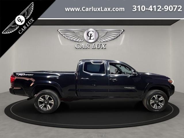 used 2018 Toyota Tacoma car, priced at $26,988