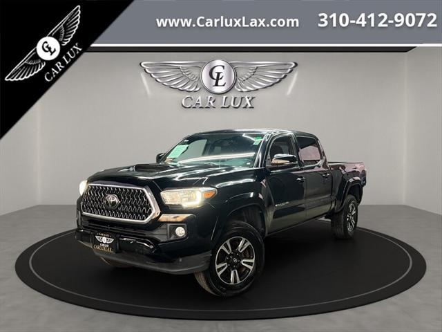 used 2018 Toyota Tacoma car, priced at $26,988