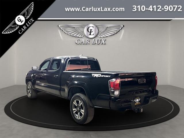 used 2018 Toyota Tacoma car, priced at $26,988