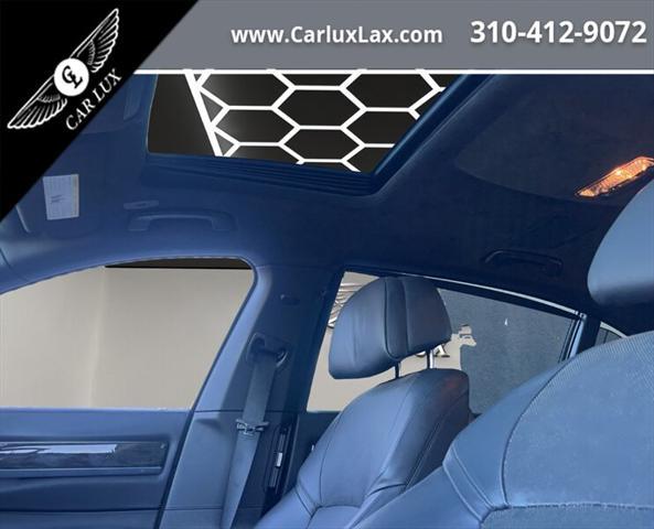 used 2014 BMW 750 car, priced at $17,988