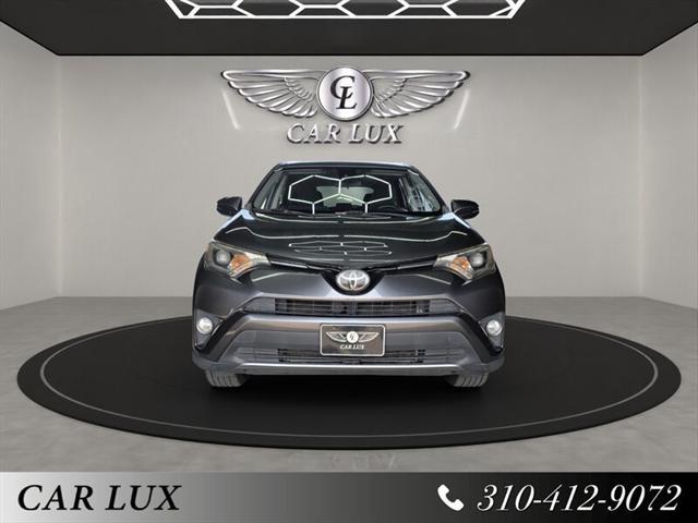 used 2018 Toyota RAV4 car, priced at $17,779