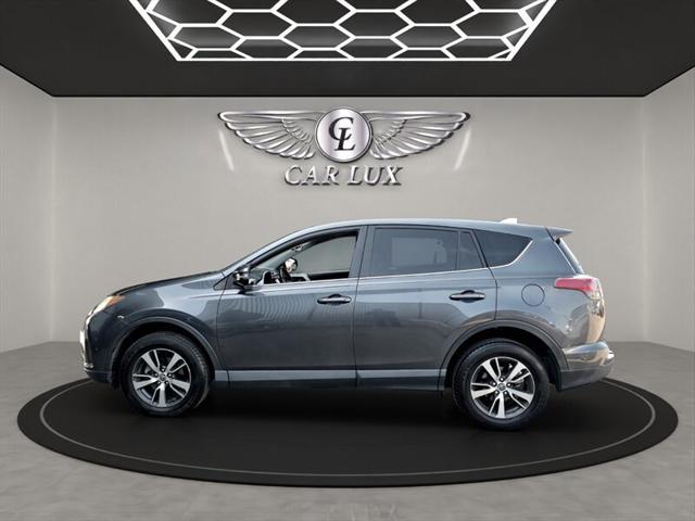 used 2018 Toyota RAV4 car, priced at $17,779