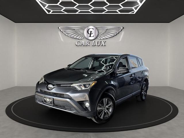 used 2018 Toyota RAV4 car, priced at $17,779