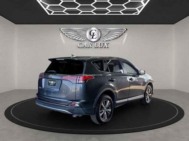 used 2018 Toyota RAV4 car, priced at $17,779