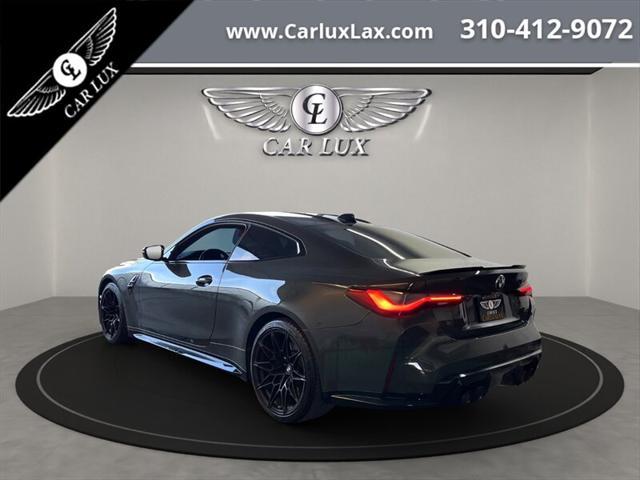 used 2022 BMW M4 car, priced at $68,979
