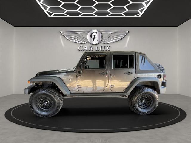 used 2018 Jeep Wrangler JK Unlimited car, priced at $18,989
