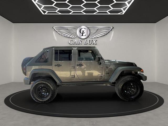 used 2018 Jeep Wrangler JK Unlimited car, priced at $18,989