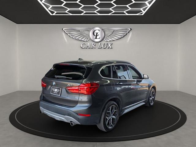 used 2018 BMW X1 car, priced at $15,987