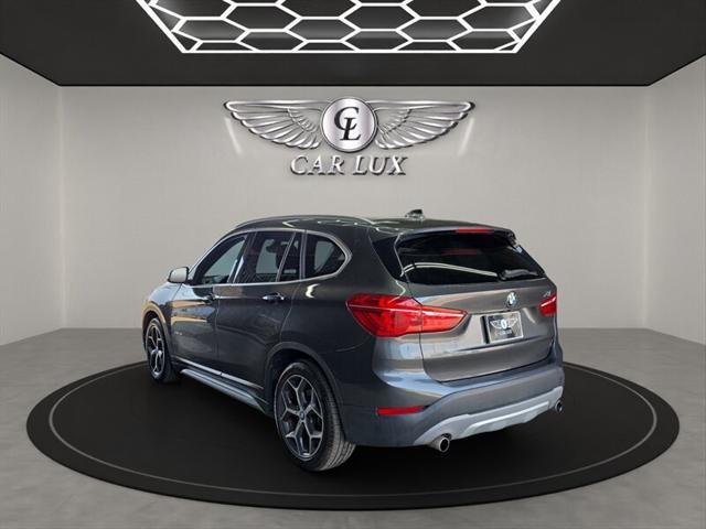 used 2018 BMW X1 car, priced at $15,987