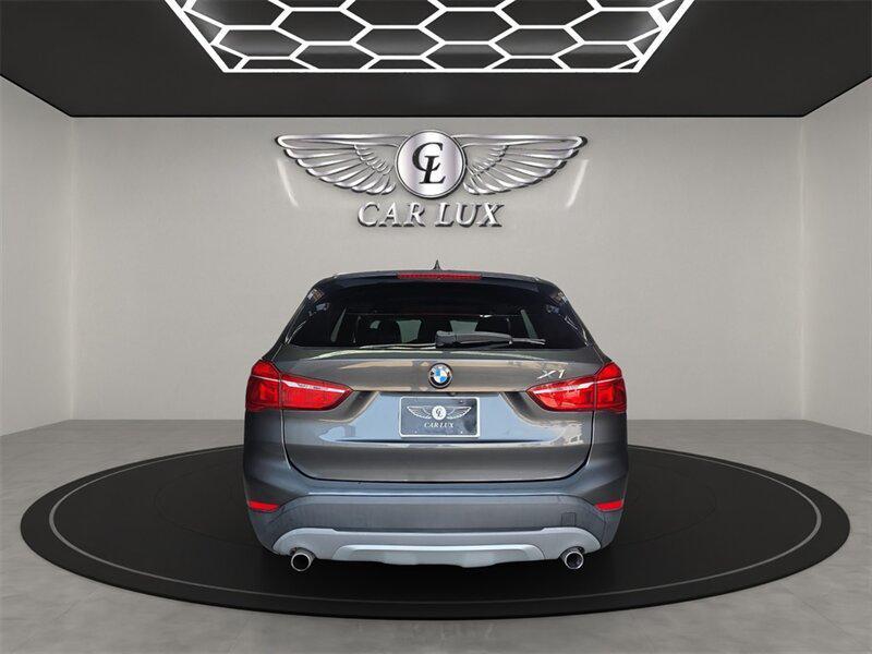used 2018 BMW X1 car, priced at $14,678