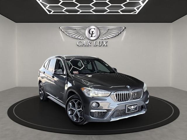 used 2018 BMW X1 car, priced at $15,987