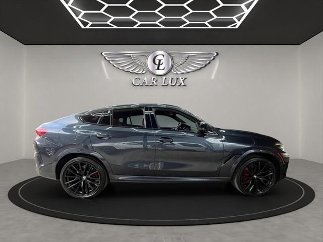 used 2022 BMW X6 car, priced at $49,979