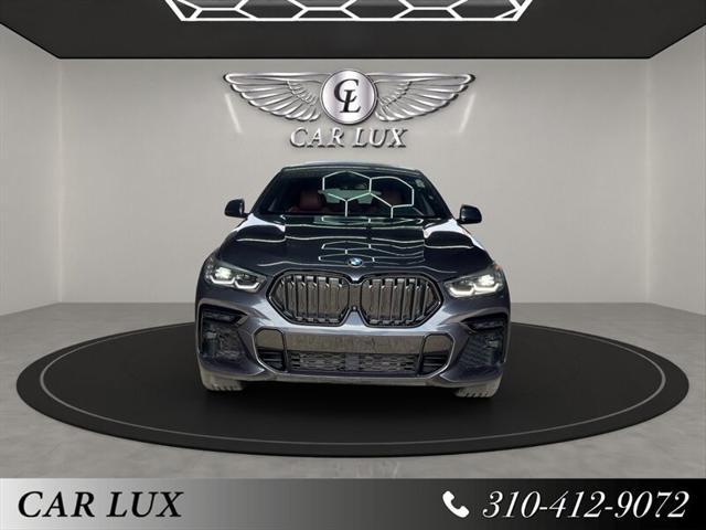 used 2022 BMW X6 car, priced at $49,979
