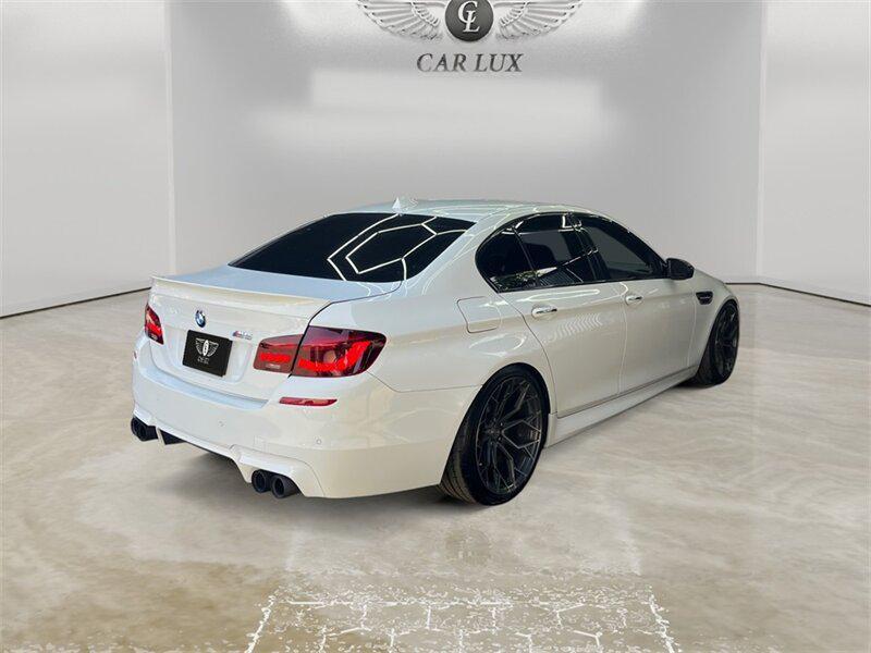 used 2015 BMW M5 car, priced at $29,991