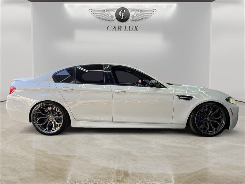 used 2015 BMW M5 car, priced at $29,991