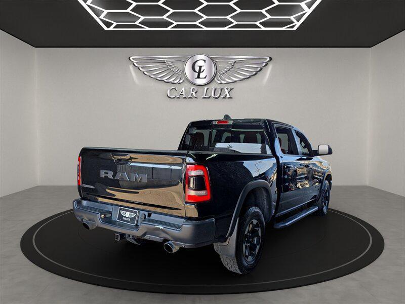 used 2019 Ram 1500 car, priced at $27,456