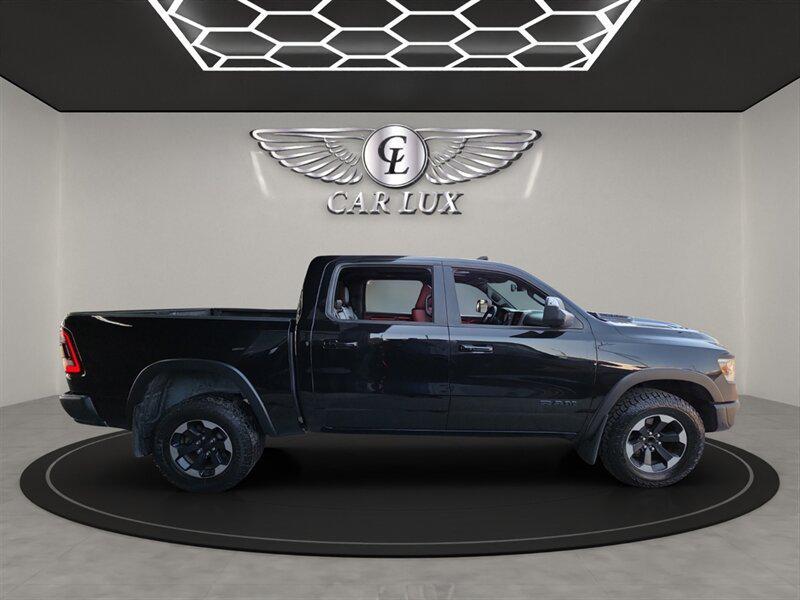 used 2019 Ram 1500 car, priced at $27,456