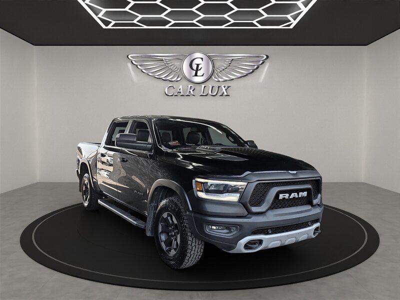 used 2019 Ram 1500 car, priced at $27,456