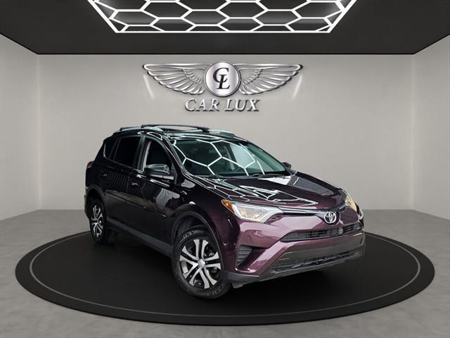 used 2016 Toyota RAV4 car, priced at $15,979
