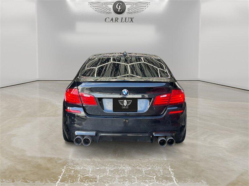 used 2014 BMW M5 car, priced at $25,991