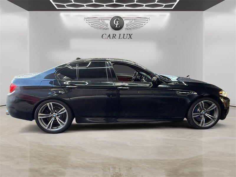 used 2014 BMW M5 car, priced at $25,991