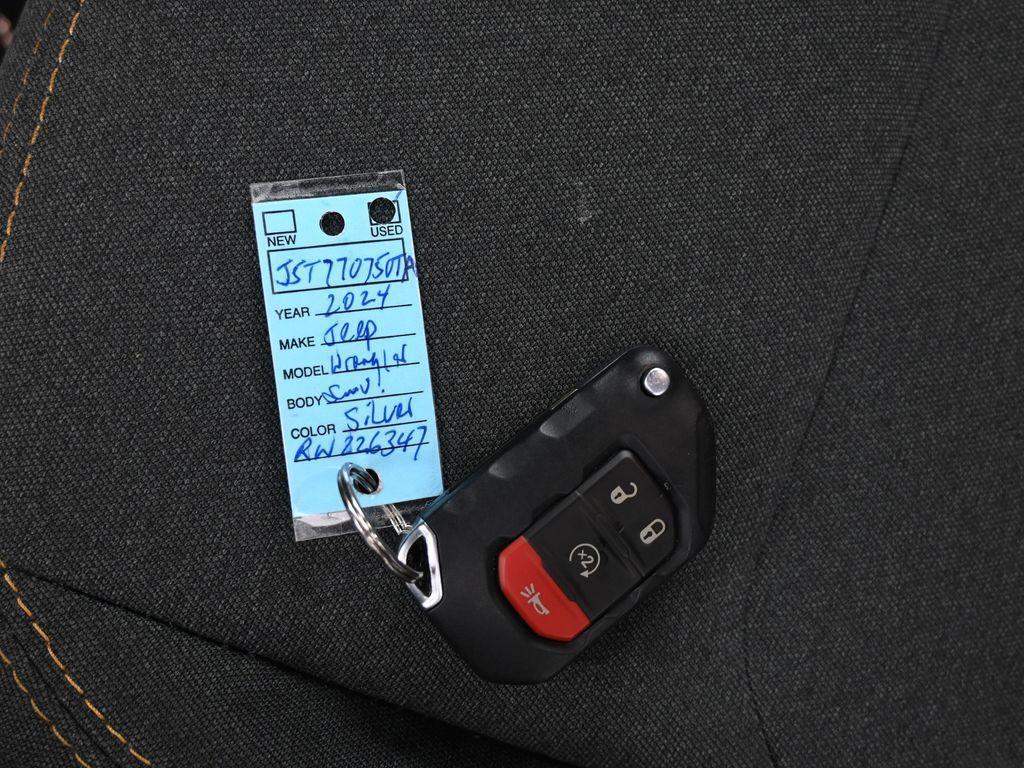 used 2024 Jeep Wrangler 4xe car, priced at $38,887