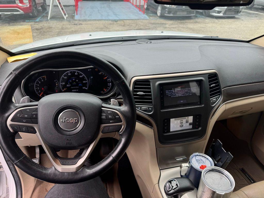 used 2014 Jeep Grand Cherokee car, priced at $11,991