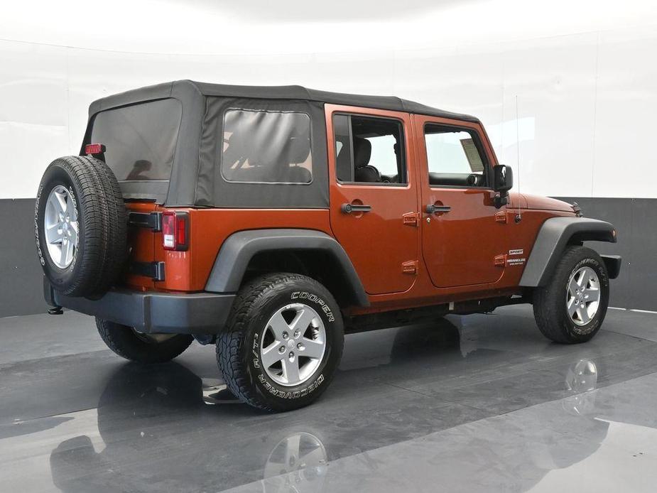 used 2014 Jeep Wrangler Unlimited car, priced at $18,921