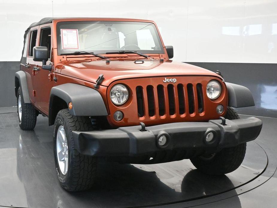 used 2014 Jeep Wrangler Unlimited car, priced at $18,921