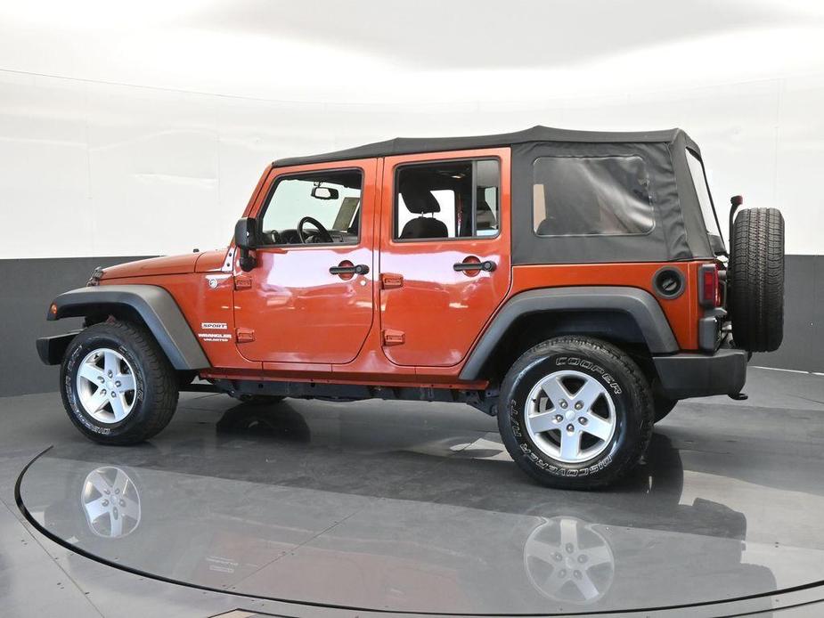 used 2014 Jeep Wrangler Unlimited car, priced at $18,921