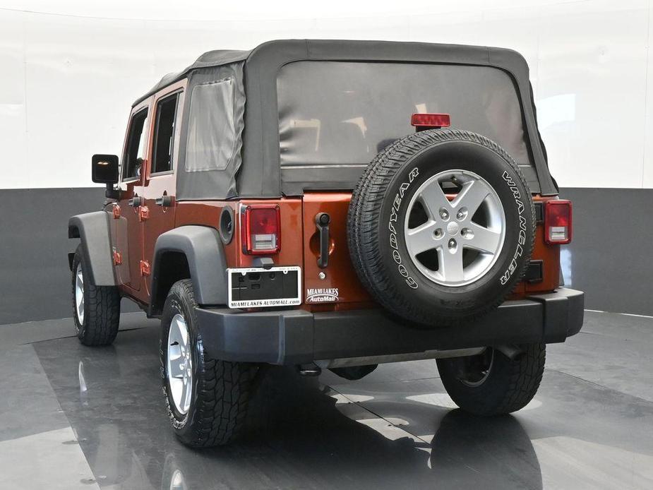 used 2014 Jeep Wrangler Unlimited car, priced at $18,921