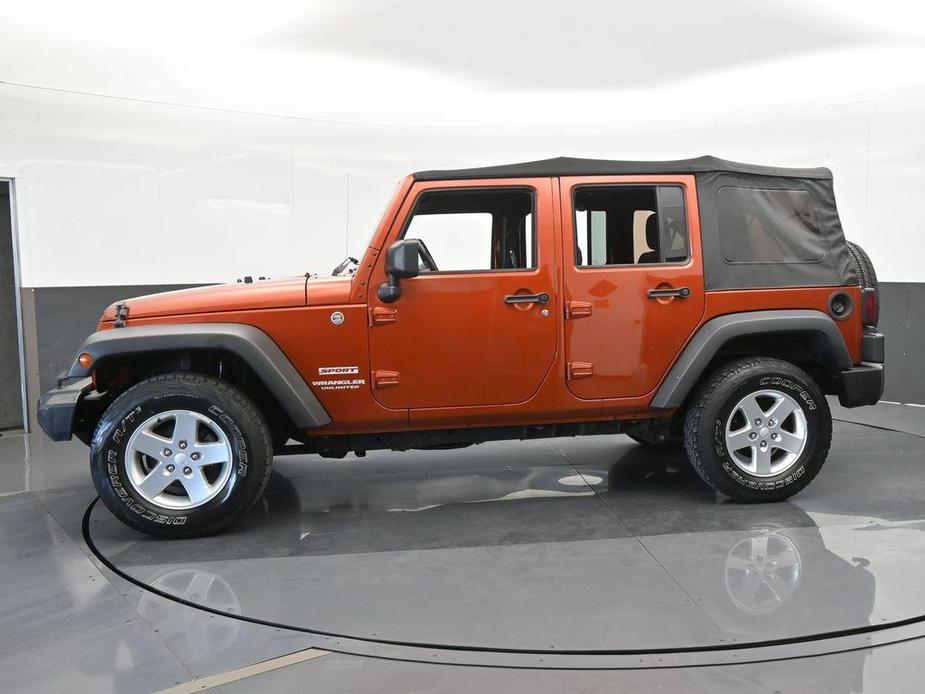 used 2014 Jeep Wrangler Unlimited car, priced at $18,921