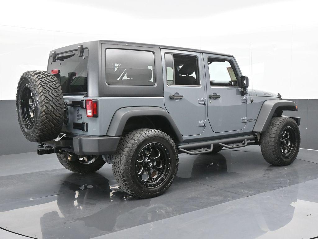 used 2015 Jeep Wrangler Unlimited car, priced at $19,769