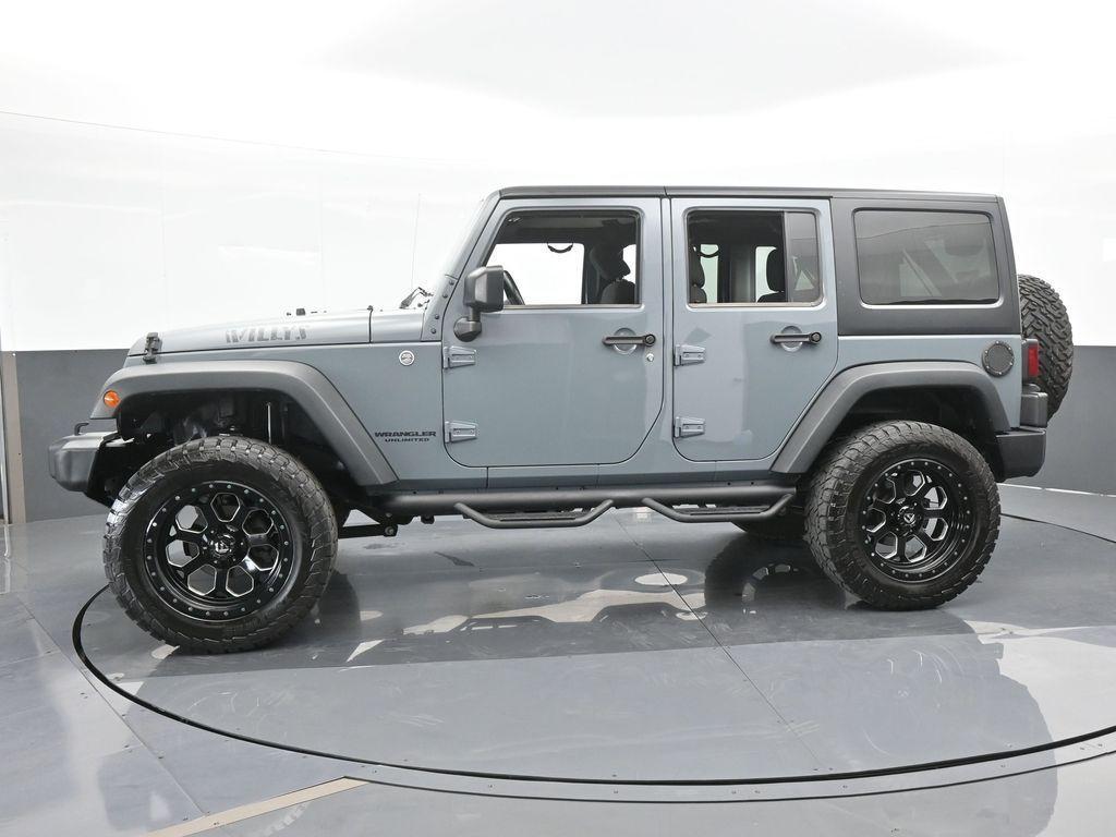 used 2015 Jeep Wrangler Unlimited car, priced at $19,769