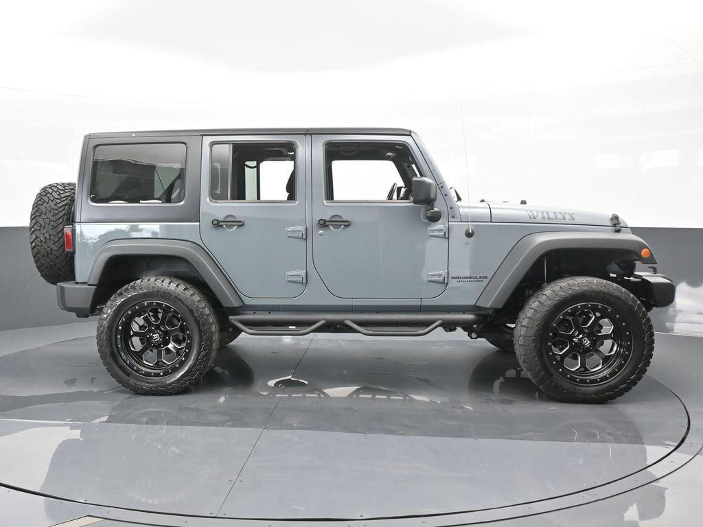 used 2015 Jeep Wrangler Unlimited car, priced at $19,769