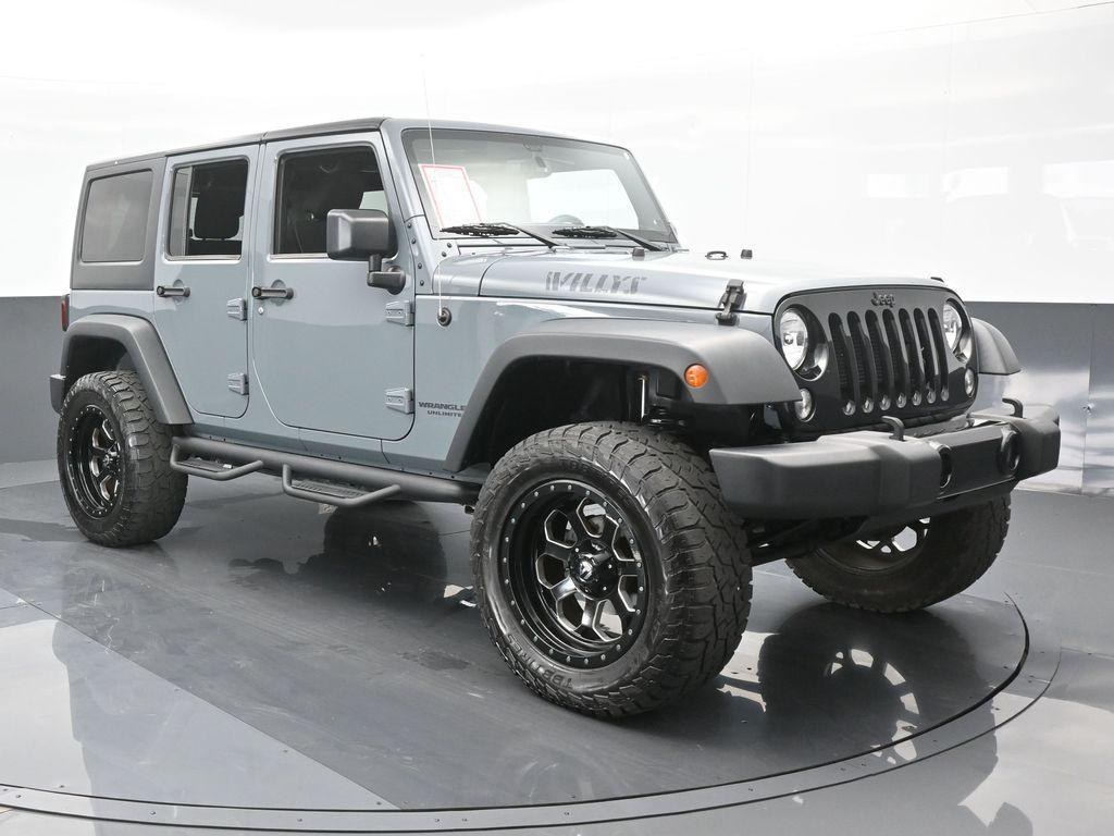 used 2015 Jeep Wrangler Unlimited car, priced at $19,769