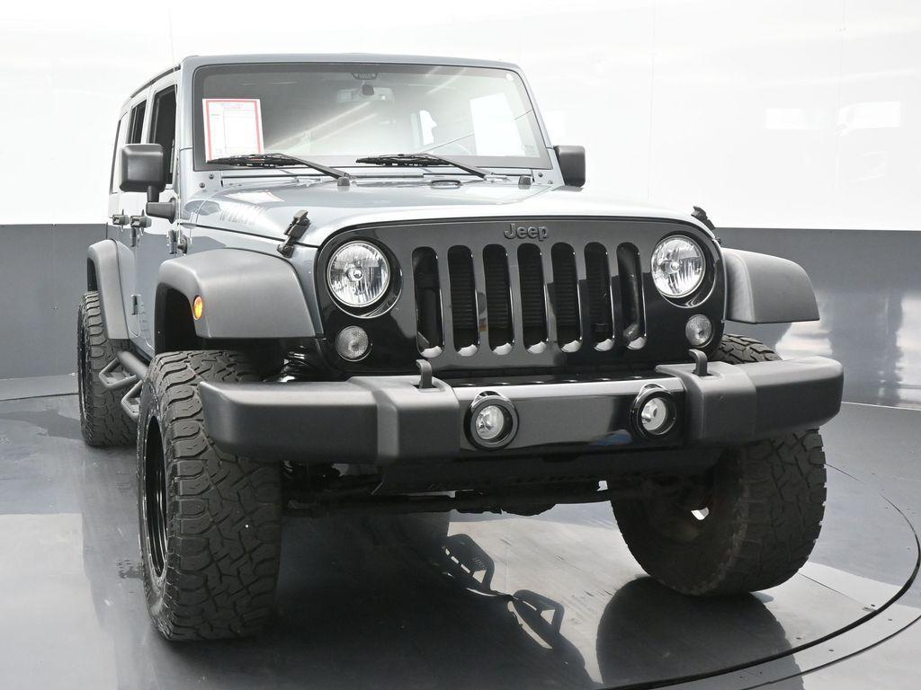 used 2015 Jeep Wrangler Unlimited car, priced at $19,769