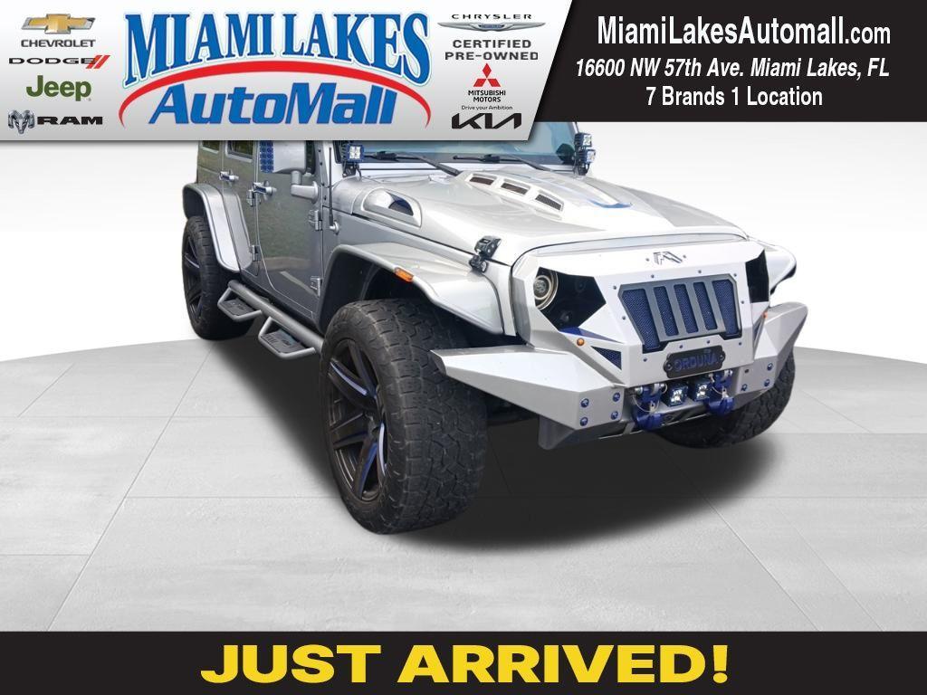 used 2018 Jeep Wrangler JK Unlimited car, priced at $21,891