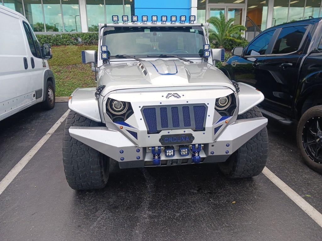 used 2018 Jeep Wrangler JK Unlimited car, priced at $21,891