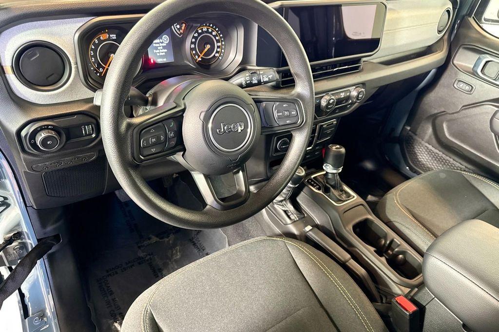 used 2025 Jeep Wrangler car, priced at $34,994