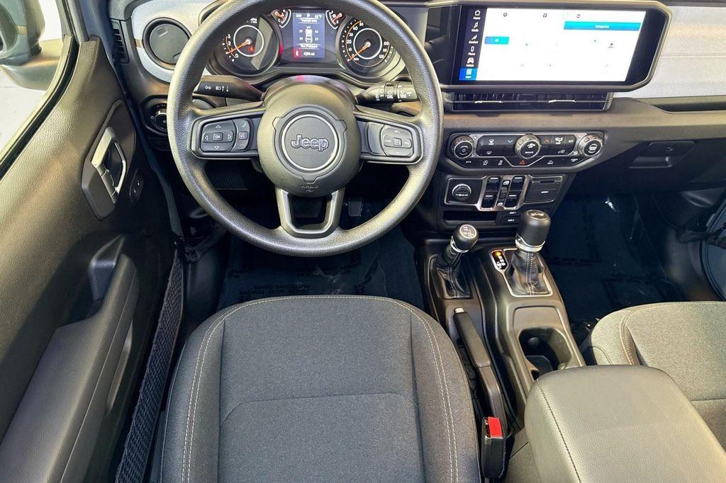 used 2025 Jeep Wrangler car, priced at $34,994