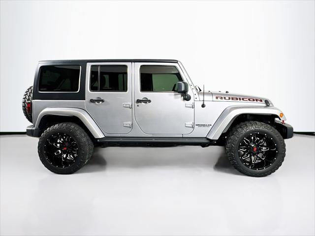 used 2016 Jeep Wrangler Unlimited car, priced at $23,993