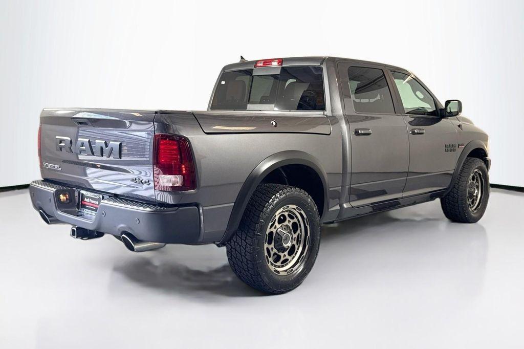 used 2018 Ram 1500 car, priced at $33,884
