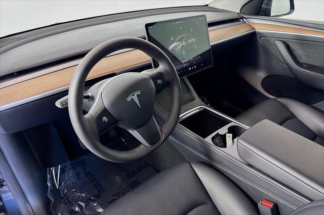 used 2024 Tesla Model Y car, priced at $33,444