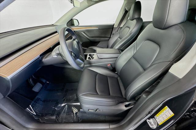 used 2024 Tesla Model Y car, priced at $33,444