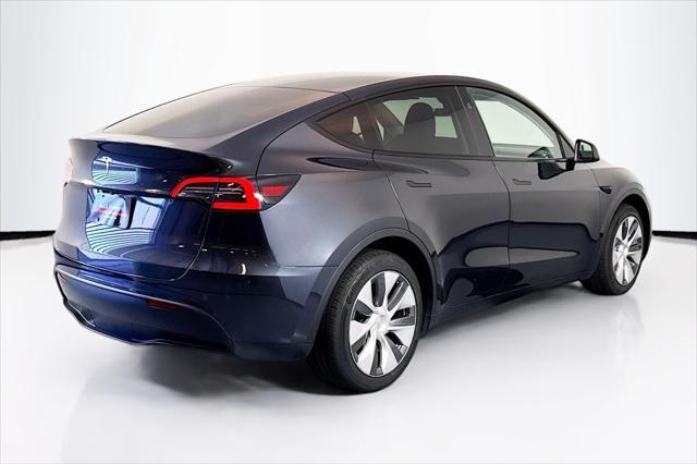 used 2024 Tesla Model Y car, priced at $33,444