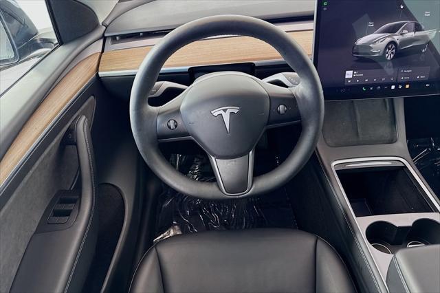 used 2024 Tesla Model Y car, priced at $33,444