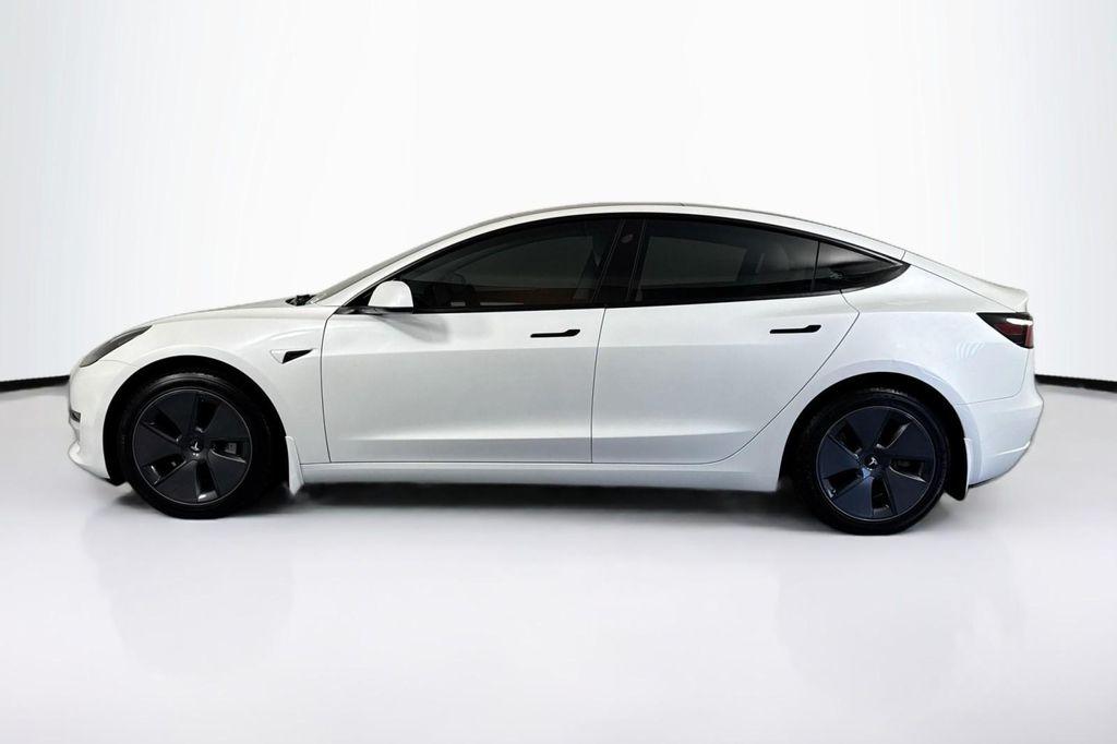 used 2023 Tesla Model 3 car, priced at $27,994